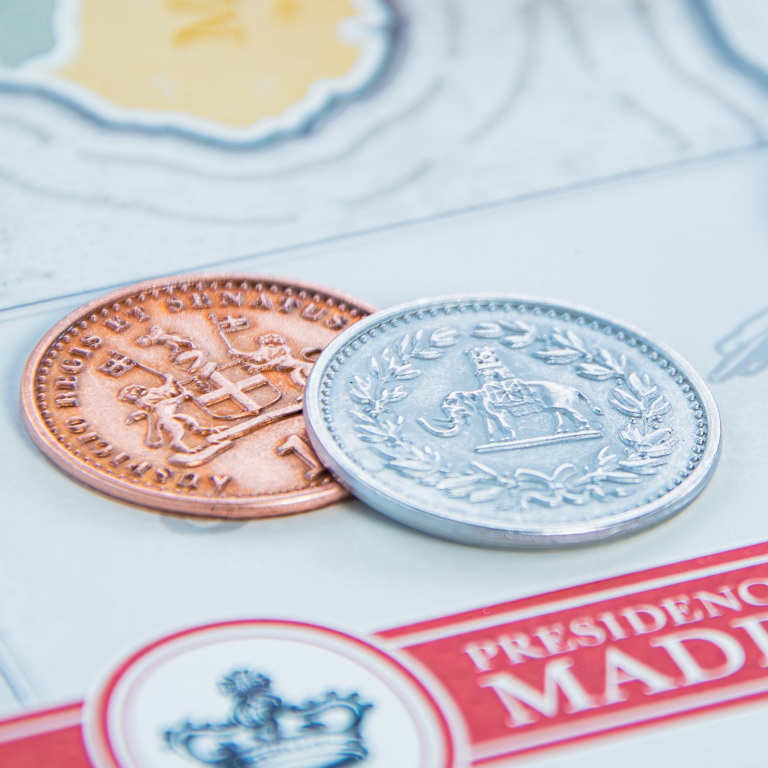 Just two of the four denominations of the John Company Metal Coins