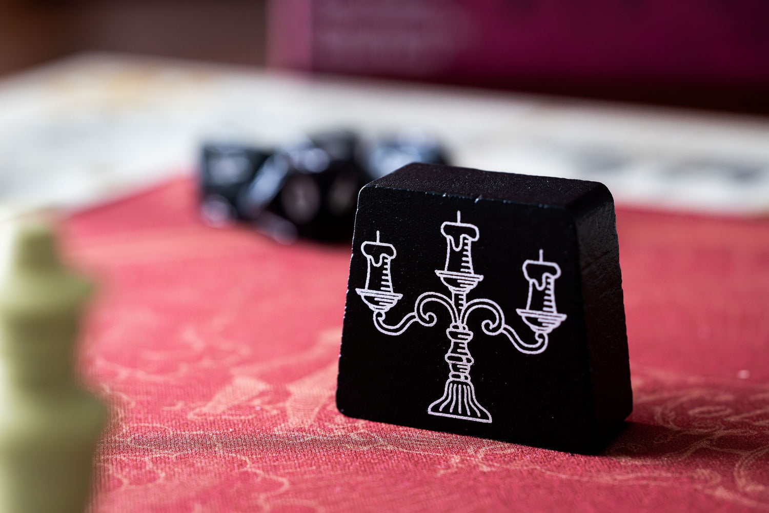 The Candelabra, a piece used to show who is throwing a festivity in the strategic party game Molly House