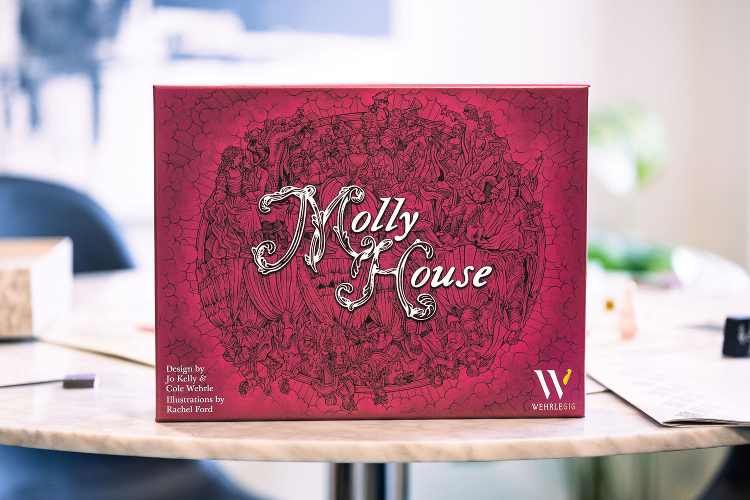 The box of Molly House, a party game for board game enthusiasts and the LGBTQ+ community designed by Jo Kelly and Cole Wehrle