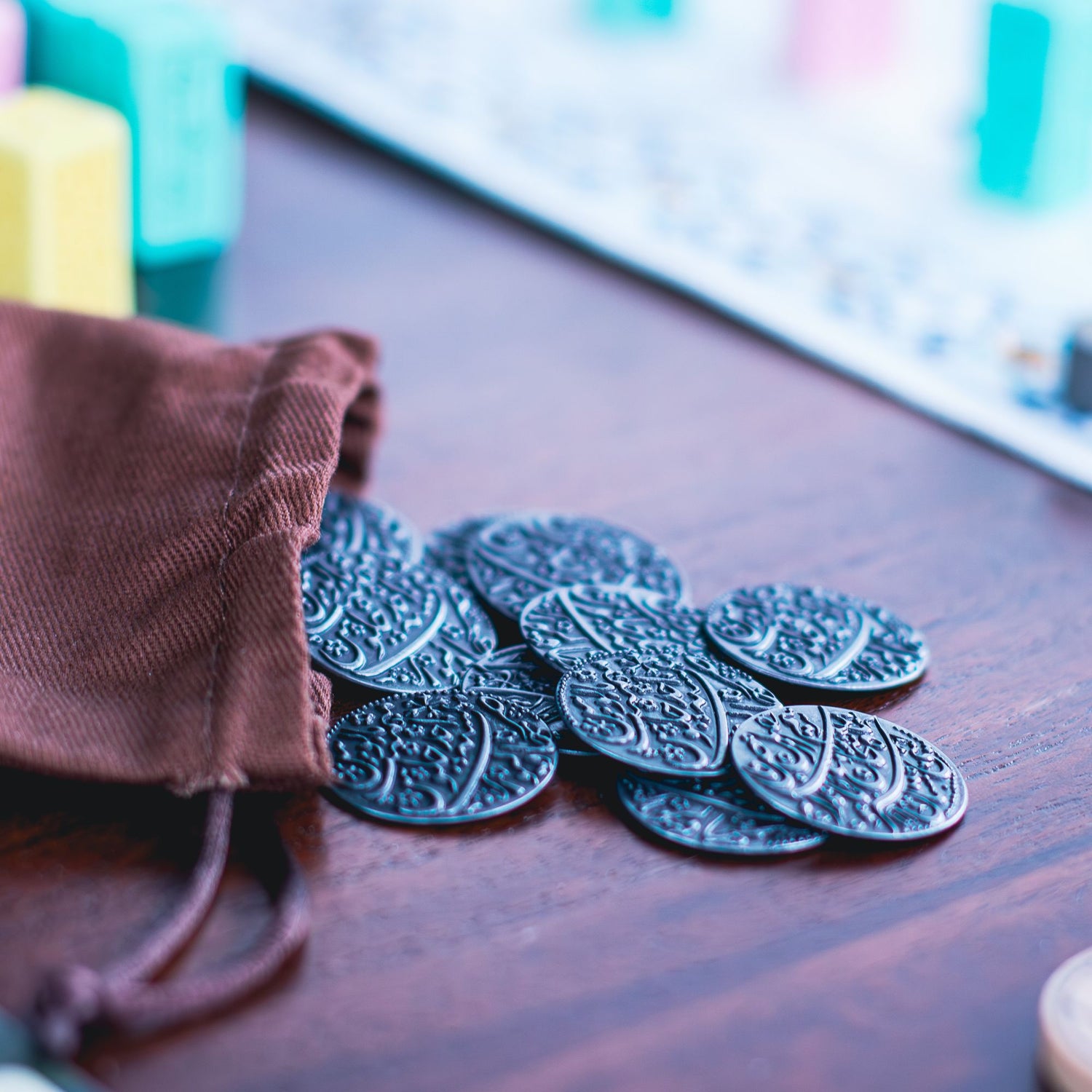 The metal coins and the cloth bag they are included with.
