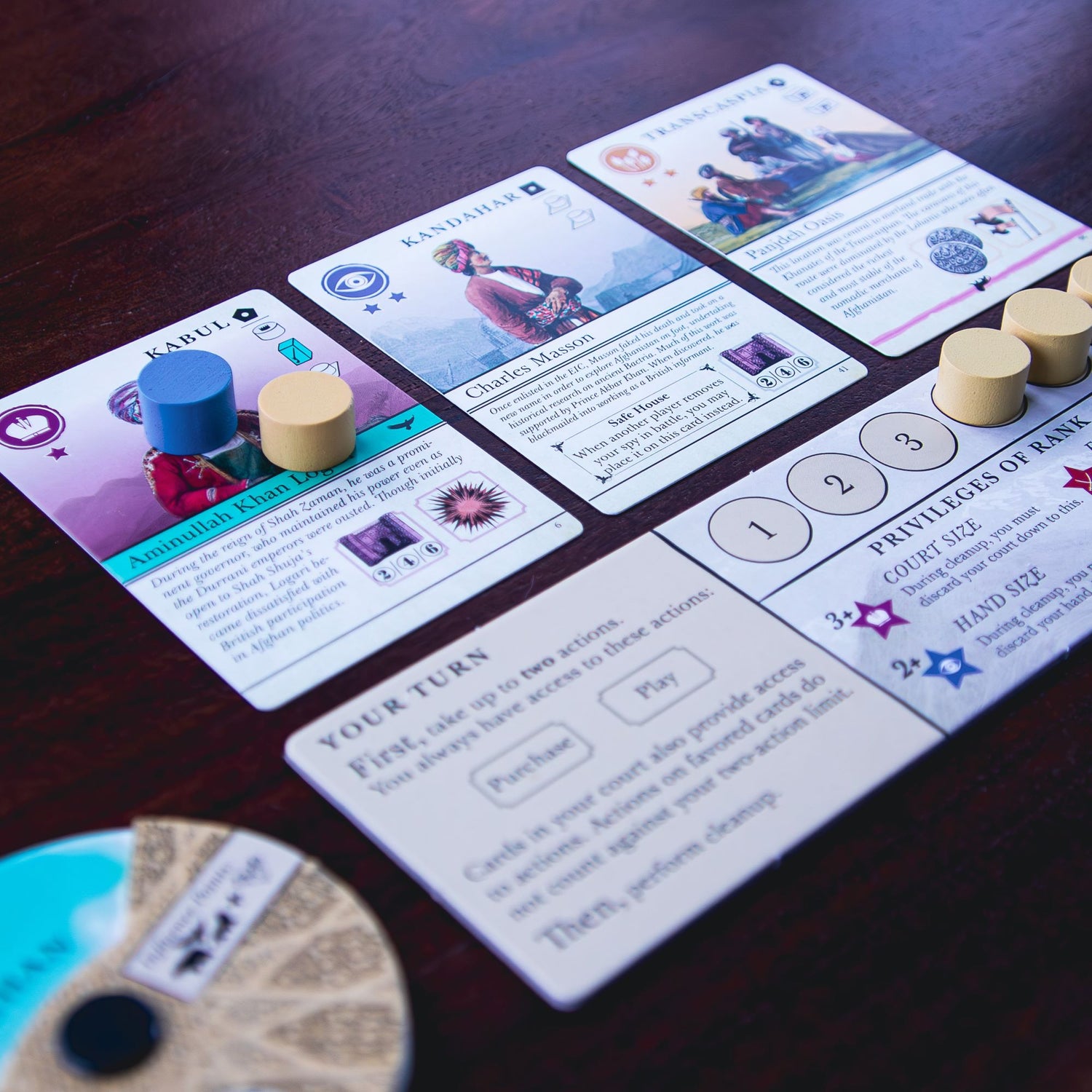 Two spies contesting a card in a front a player in Pax Pamir: Second Edition. What will happen next?